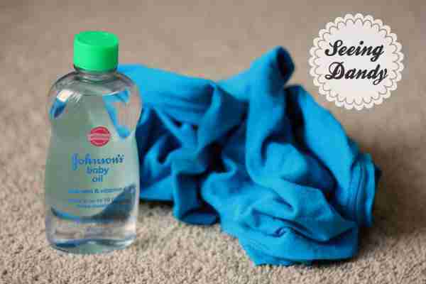 Baby oil bottle and old rag to clean stainless steel appliances.