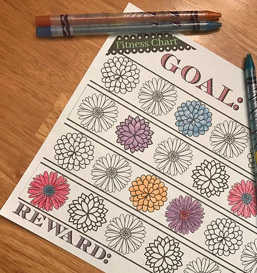 Fitness reward chart with color pencils.