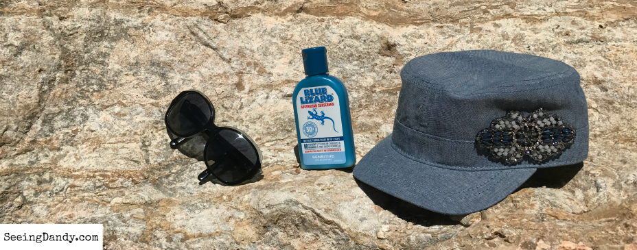 Michael Kors sunglasses, Blue Lizard sunscreen, jean cap