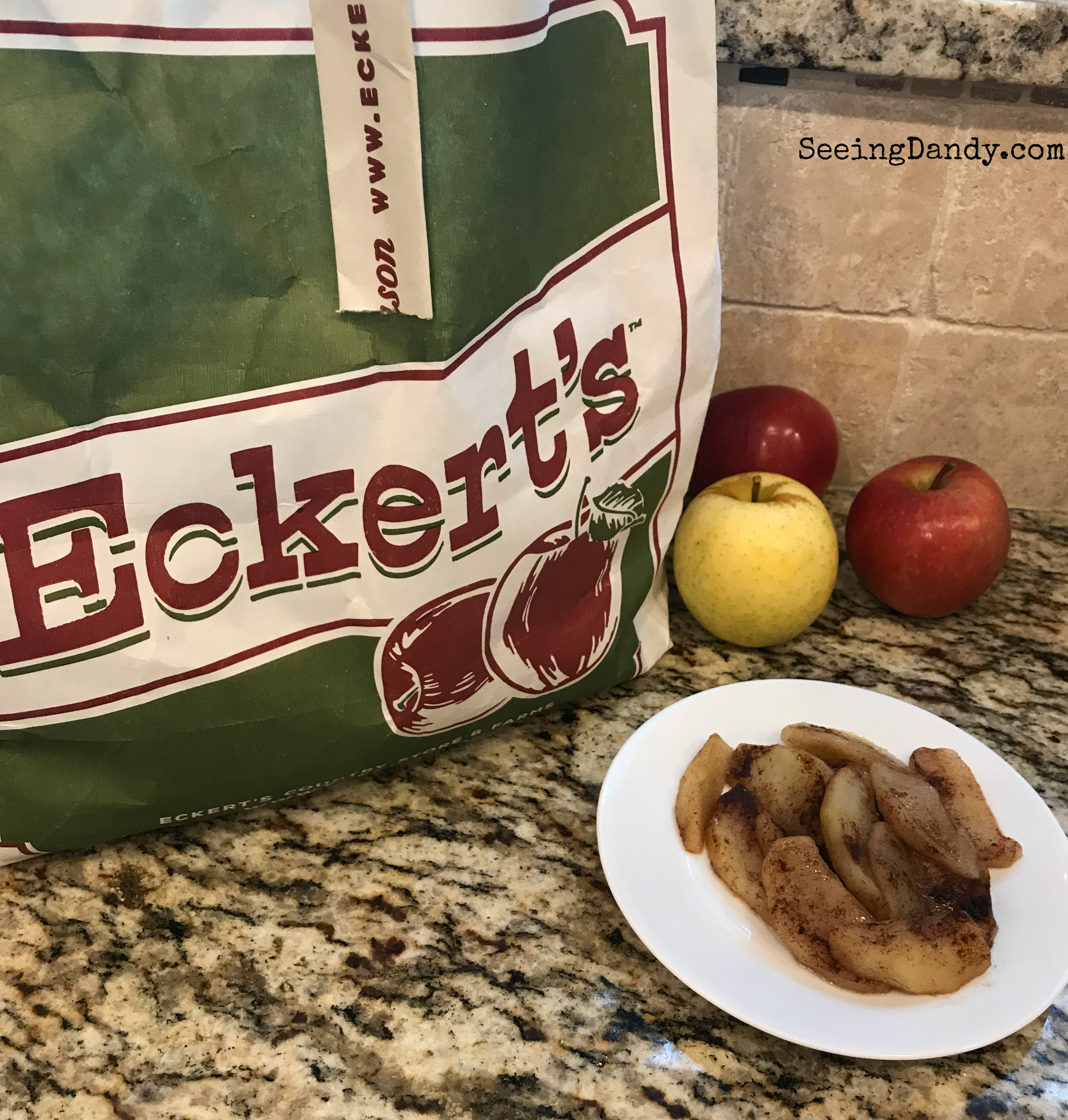Eckert's orchard bag in the kitchen. Delicious foil baked apples finished and flavored with cinnamon on granite counter top. 