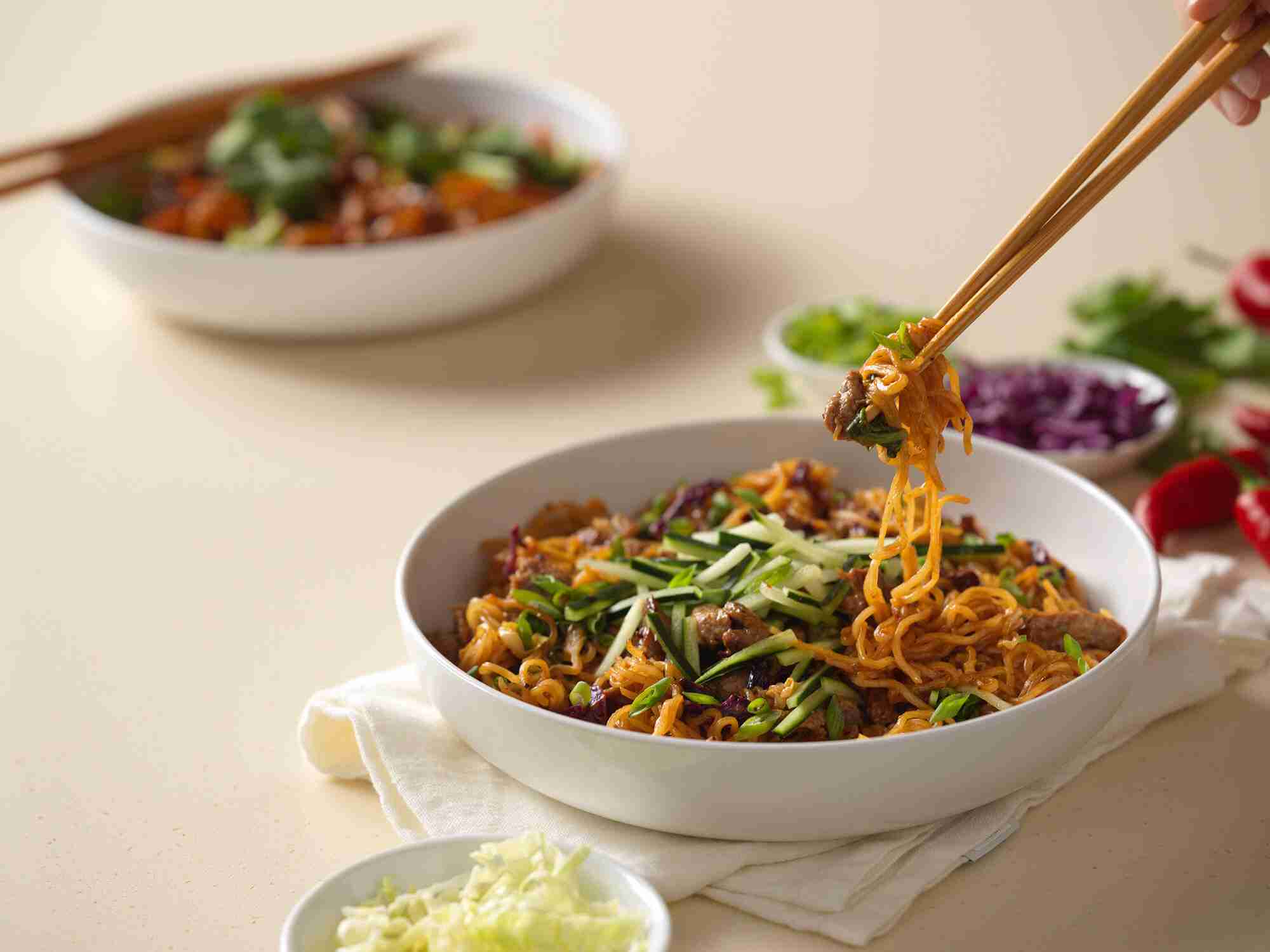 Noodles & Co. gluten free Thanksgiving sides with chopsticks.