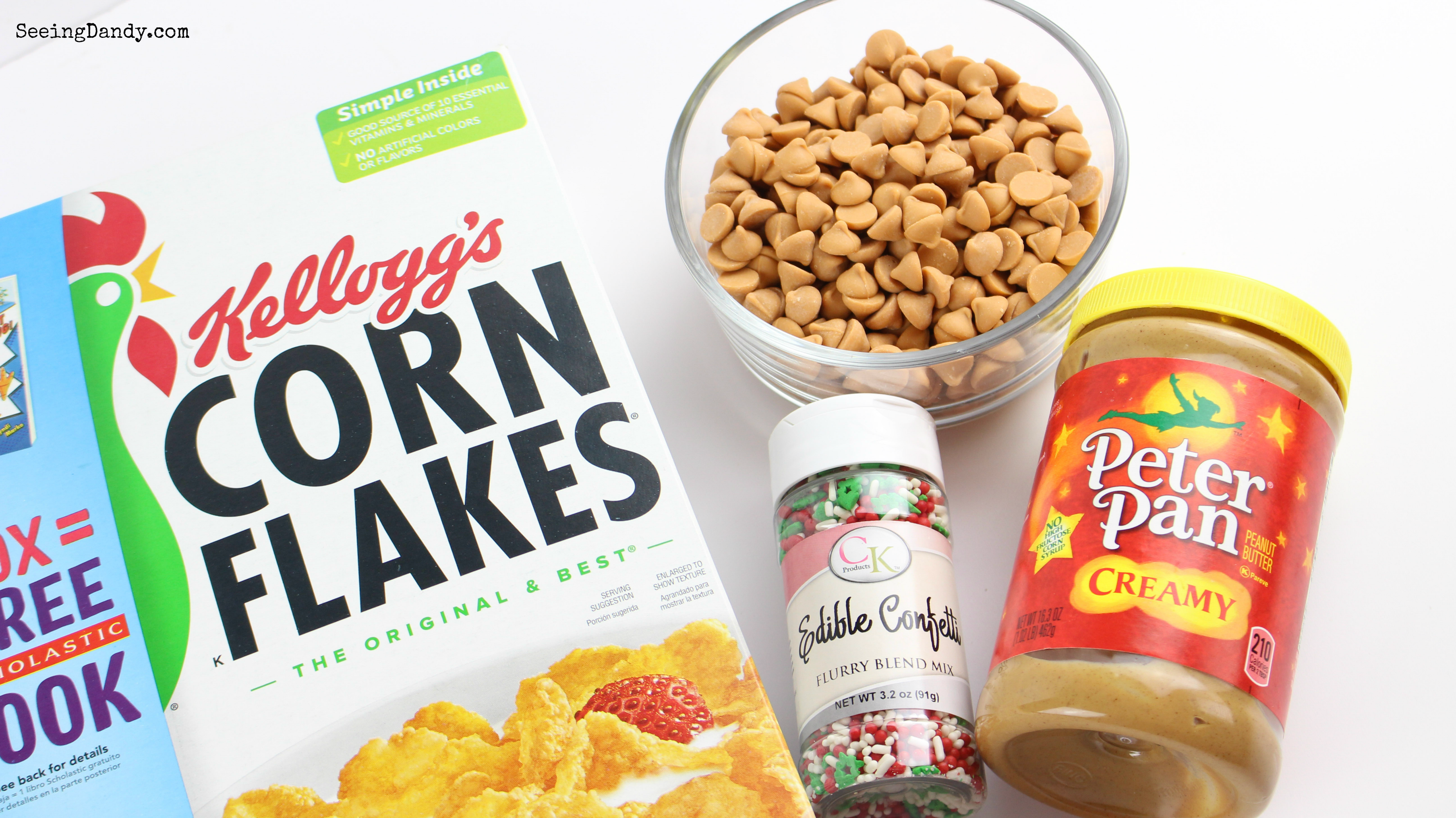 Ingredients for easy to make Christmas Crunchies No Bake Holiday Treats. Butterscotch morsels, corn flakes, peanut butter, sprinkles