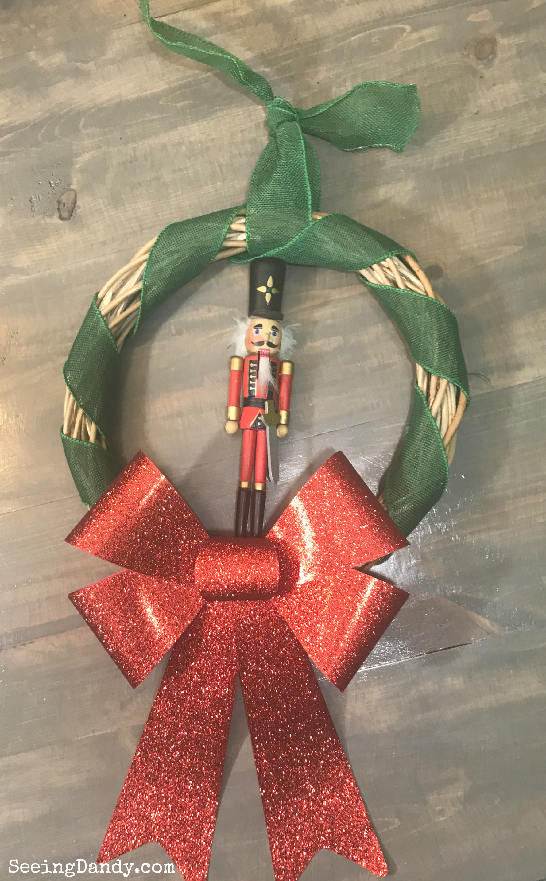 DIY Nutcracker Christmas wreath with ribbon hanger.
