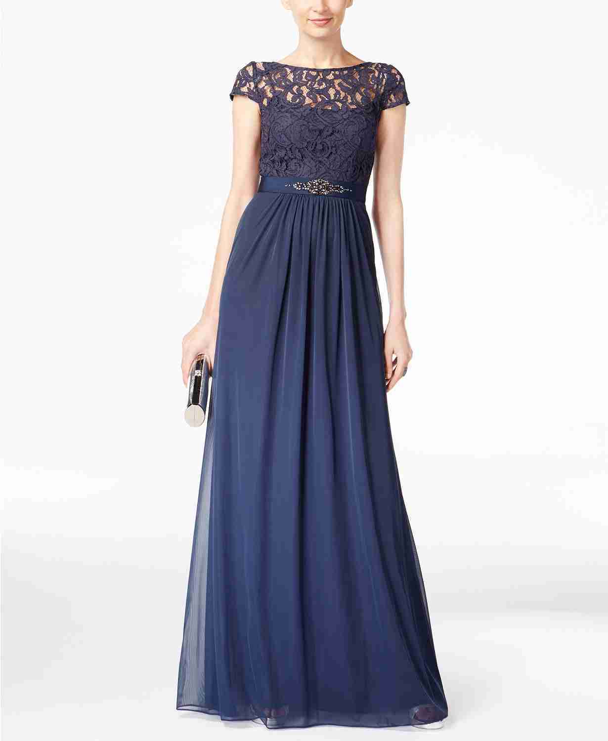Adrianna Papell midnight blue formal gown with illusion lace and elegant accents.