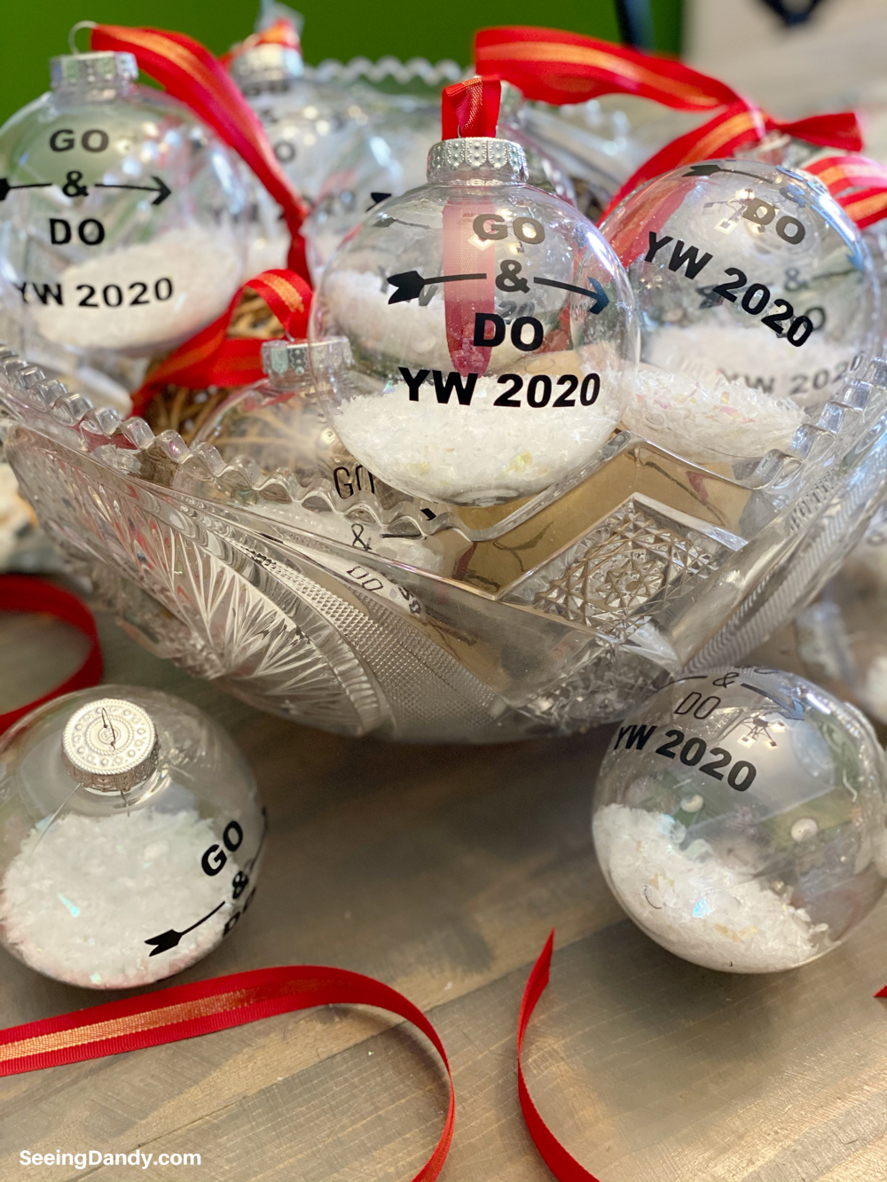 craft ornaments, antique crystal punch bowl, vintage crystal punch bowl, DIY YW Christmas ornament, lds christmas ornaments, 2020 youth theme, go and do, the church of jesus christ of latter day saints, easy to make christmas ornaments, free svg file, red ribbon, clear ball ornaments, plastic ornaments