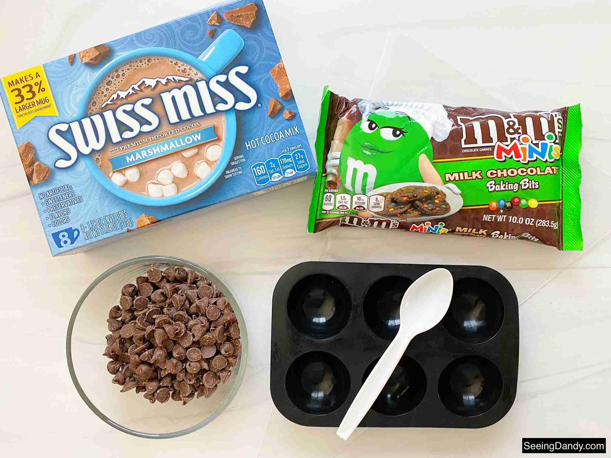 swiss miss hot chocolate mini marshmallows, milk chocolate baking bits, chocolate chips, mini m&ms, hot chocolate bomb silicone mold, half circle silicone mold