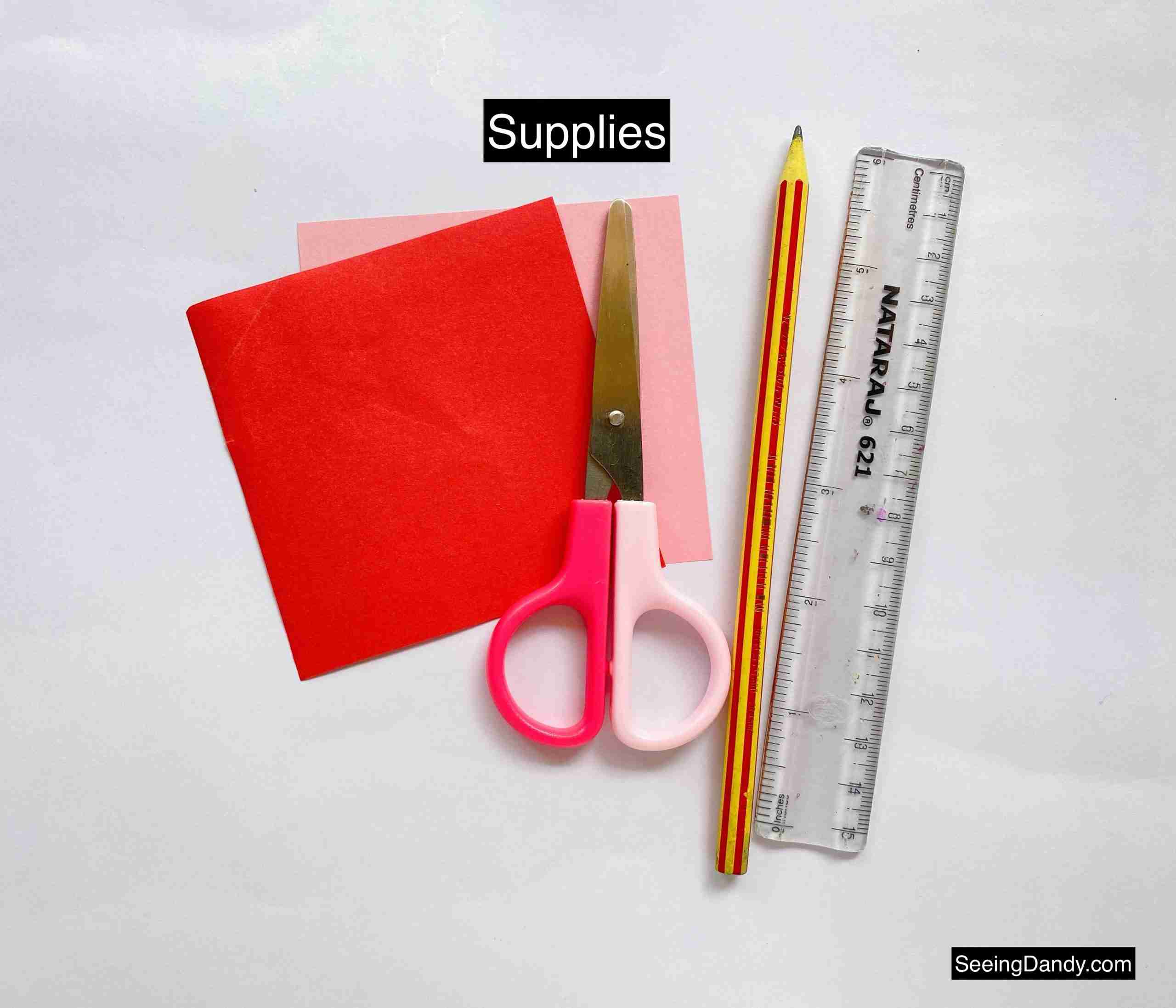 origami paper, scissors, craft supplies, stripe pencil, clear ruler