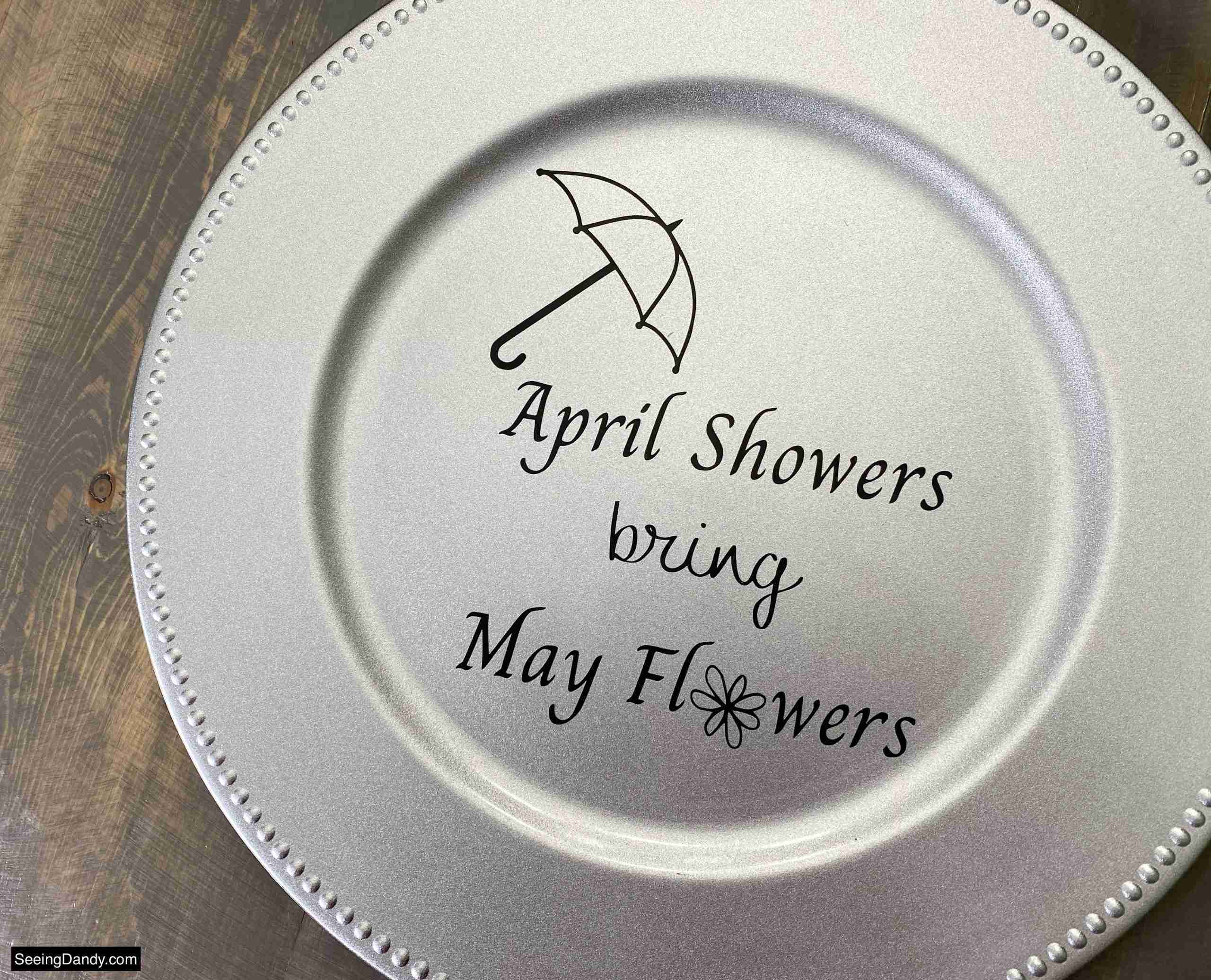 april showers bring may flowers svg file, free svg file, vinyl craft, umbrella svg file, free printables, silver dollar tree plastic charger plate, dollar tree craft ideas, farmhouse table, easy crafts