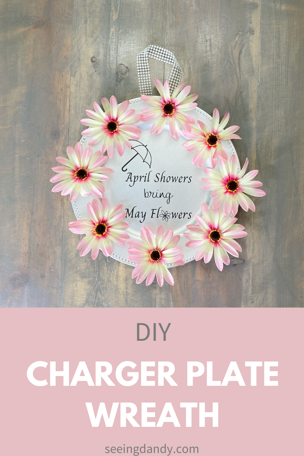 diy april showers bring may flowers sign, pink daisies, wreath ideas, springtime decor, spring wreath craft, home decor, farmhouse style, dollar tree craft, silver plastic charger plate, farmhouse table, pink spring flowers, silhouette craft, cricut craft
