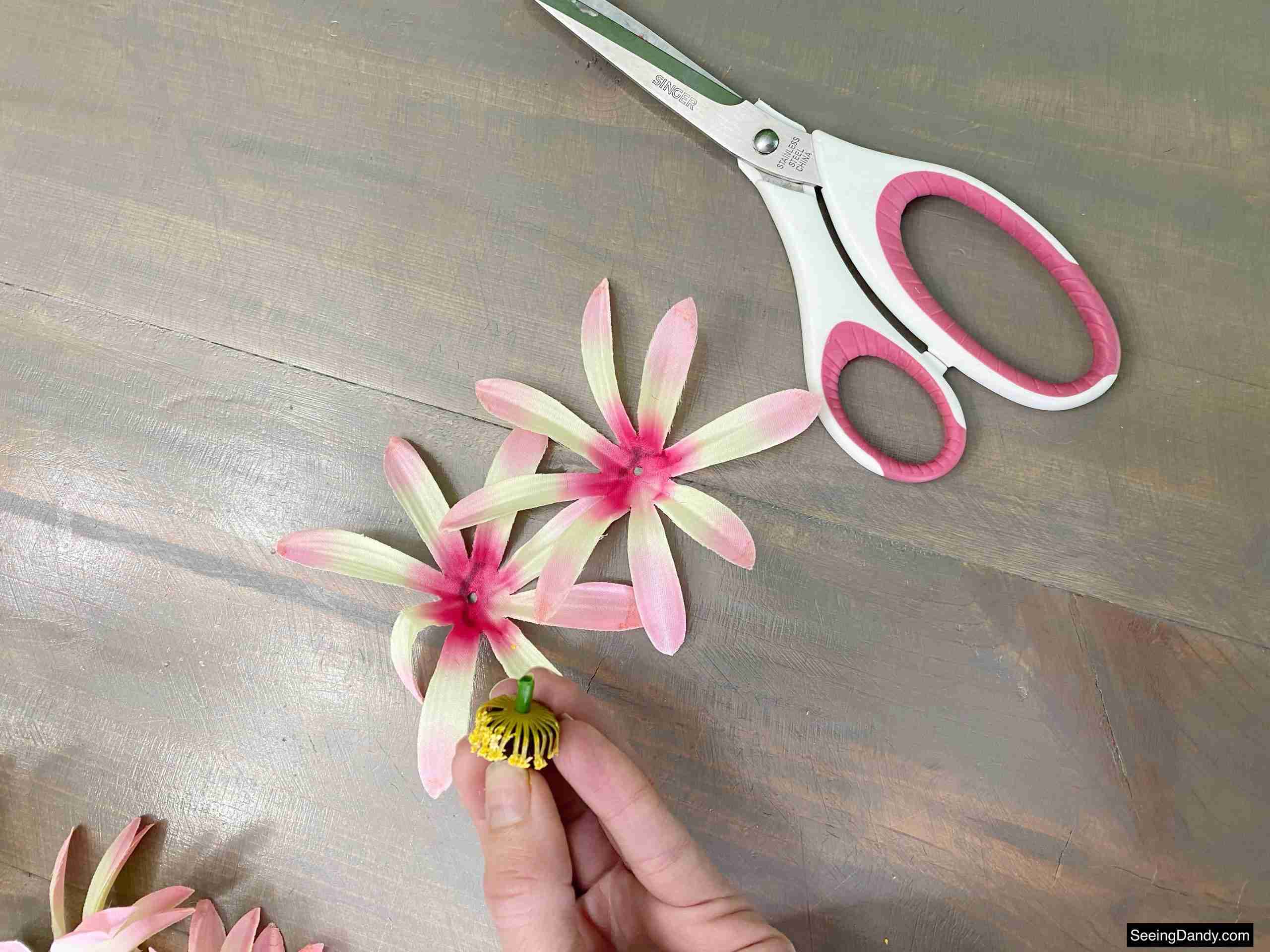pink dollar tree flowers, dollar tree craft ideas, pink scissors, farmhouse table, easy crafts, artificial flowers craft