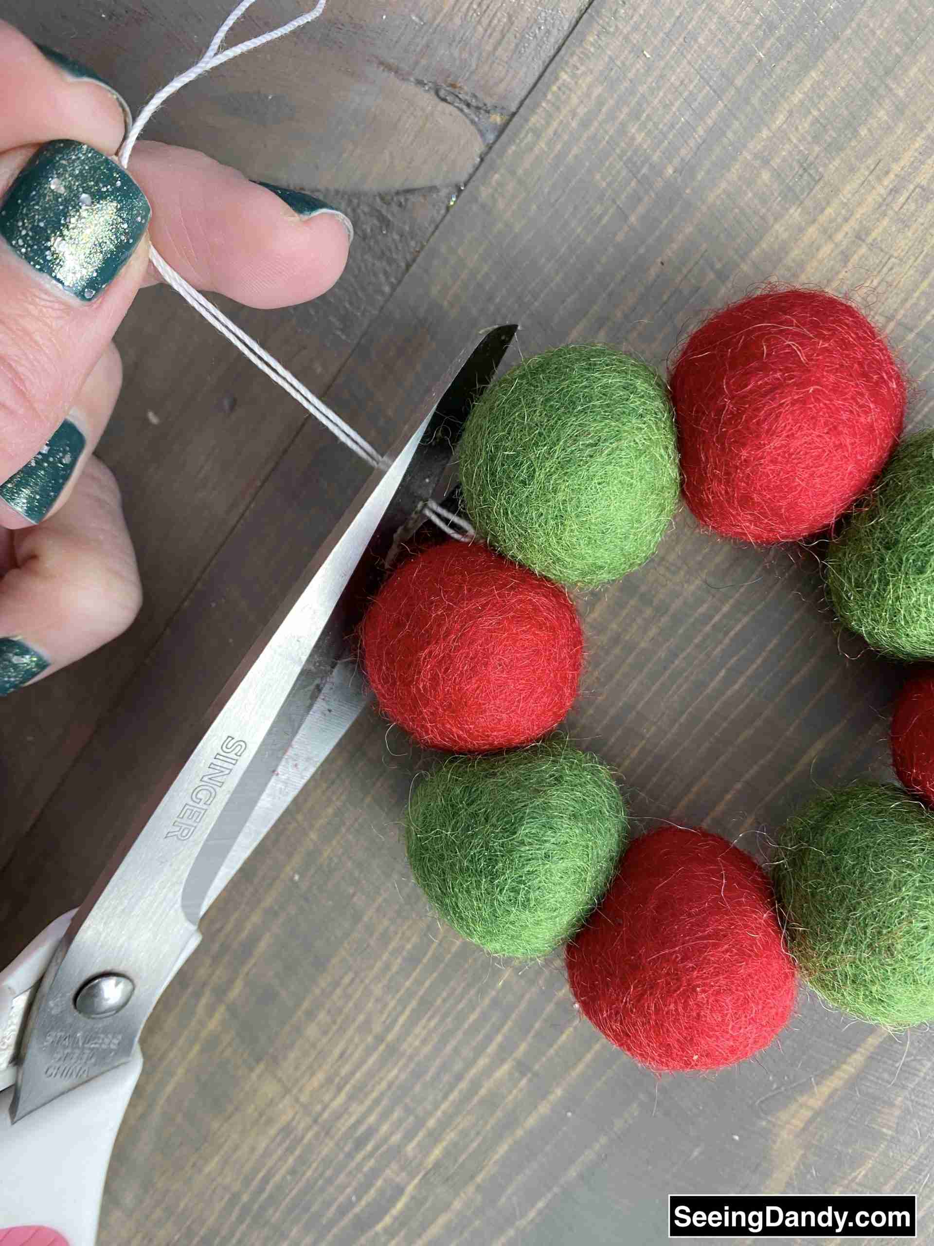 red and green wool felt balls