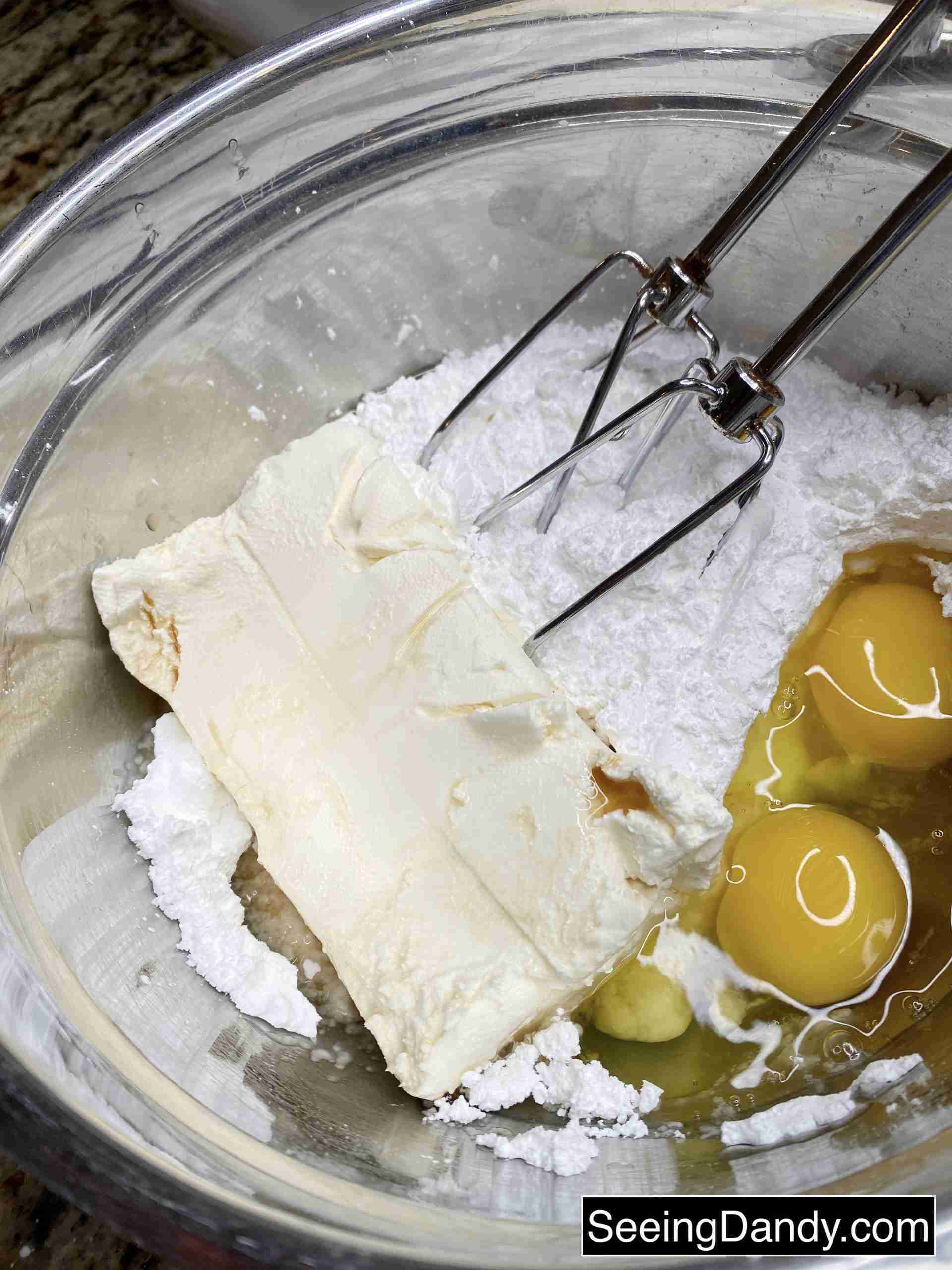 mixing cream cheese filling