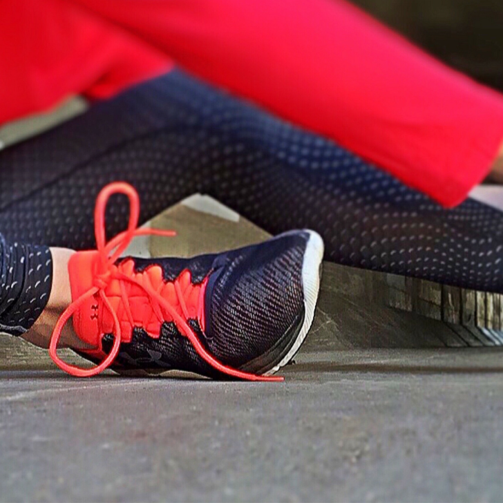 Easy health and wellness ideas. Black and red running shoes with exercise clothing.