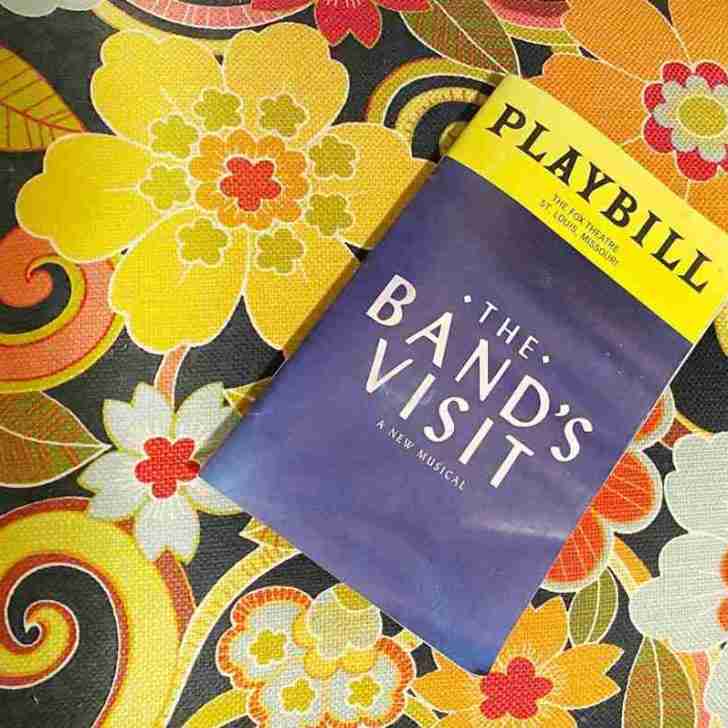 The Band's Visit Playbill on floral background
